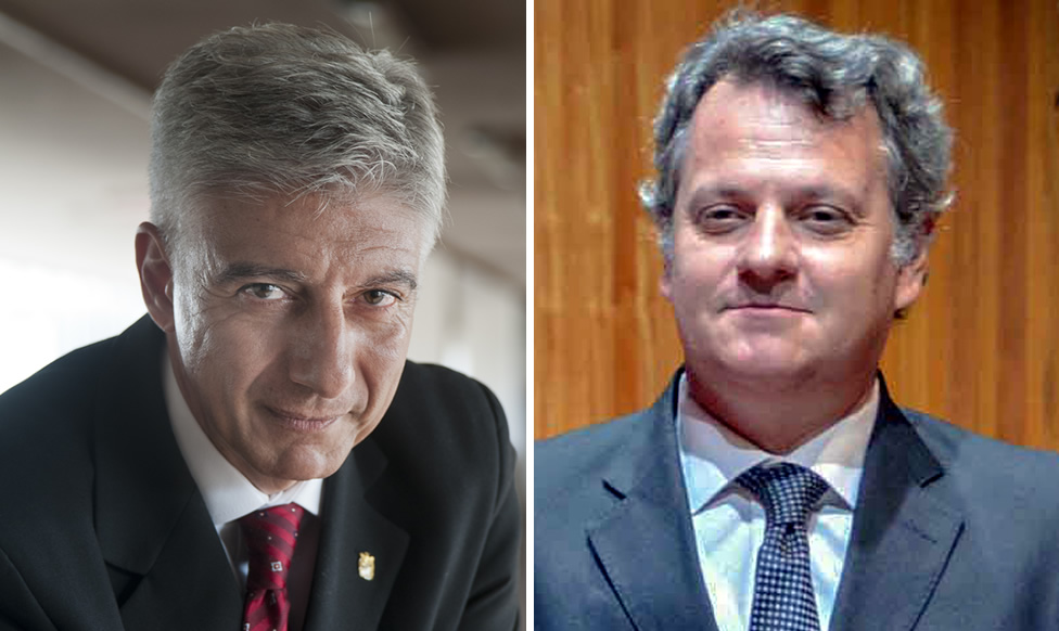 Enrique Neder y Ricardo Descalzi vestidos con camisa, corbata y saco